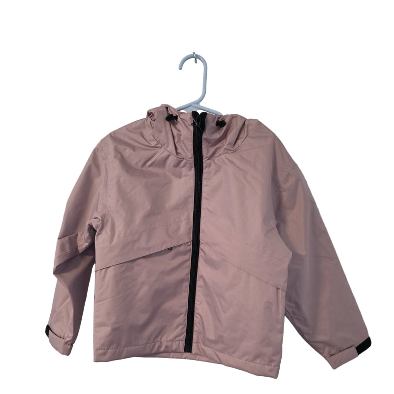 Pink jacket with black zipper on a hanger against a white wall-Willapa Outdoor