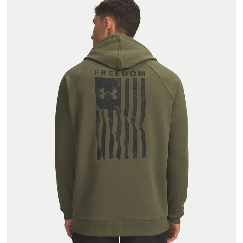 Person wearing a green hoodie with 'Freedom' and an American flag design on the back, on a white background. Willapa Outdoor