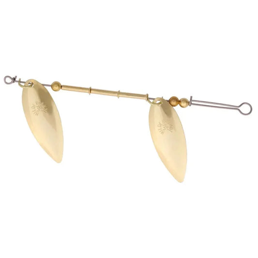 A gold-colored metal fishing spinnerbait lure with two teardrop blades, a central rod, decorative beads, and a split hook attachment, shown against a plain white background.