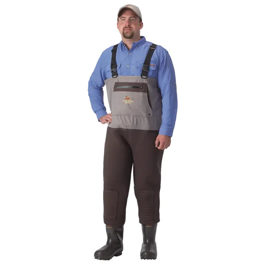 Man wearing a blue shirt, gray waders, and black boots on a white background-Willapa Outdoor