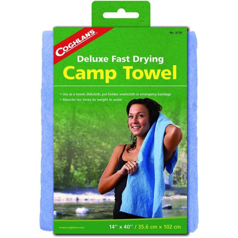 Coghlan's Deluxe Fast Drying Camp Towel packaging with a woman using the towel outdoors. Willapa Outdoor
