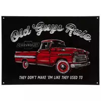 Red truck with 'Old Guys Rule' text on a black background