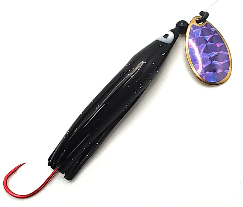 A fishing jig lure with a black skirted body, white eye detail, a red hook, and an iridescent purple-blue metal blade with a gold rim, shown on a white background.